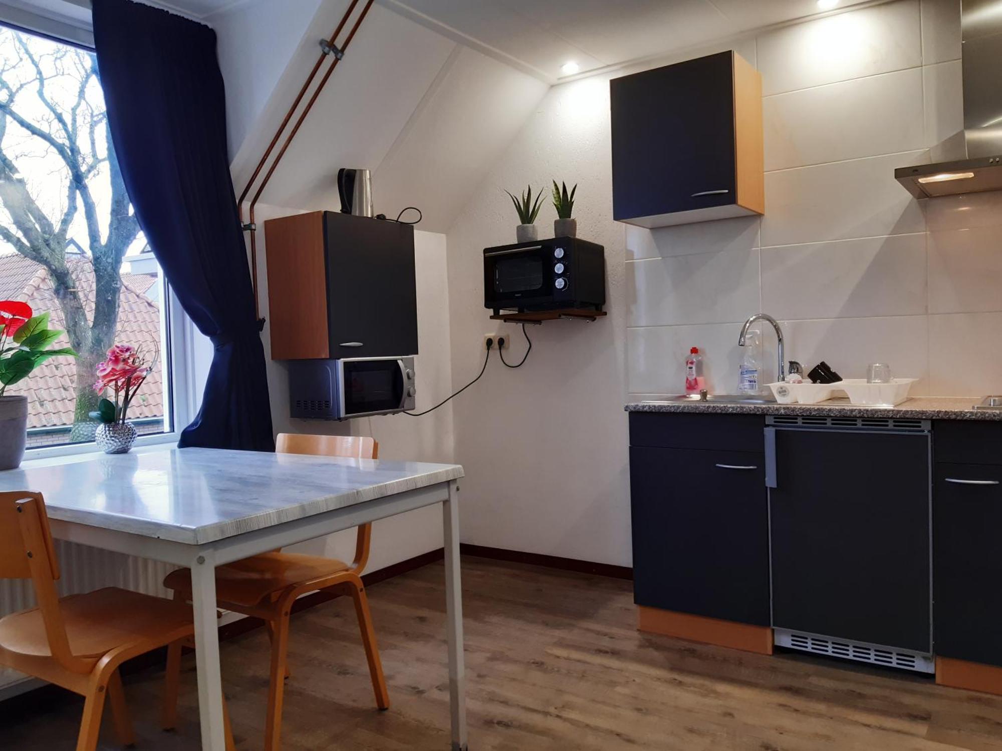 Pension Het Hoefijzer Buren  Bagian luar foto