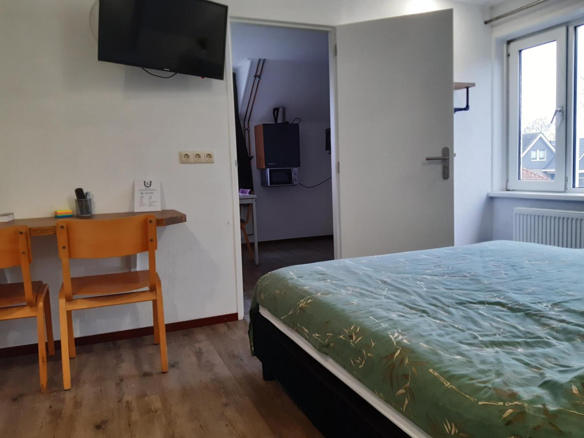 Pension Het Hoefijzer Buren  Bagian luar foto